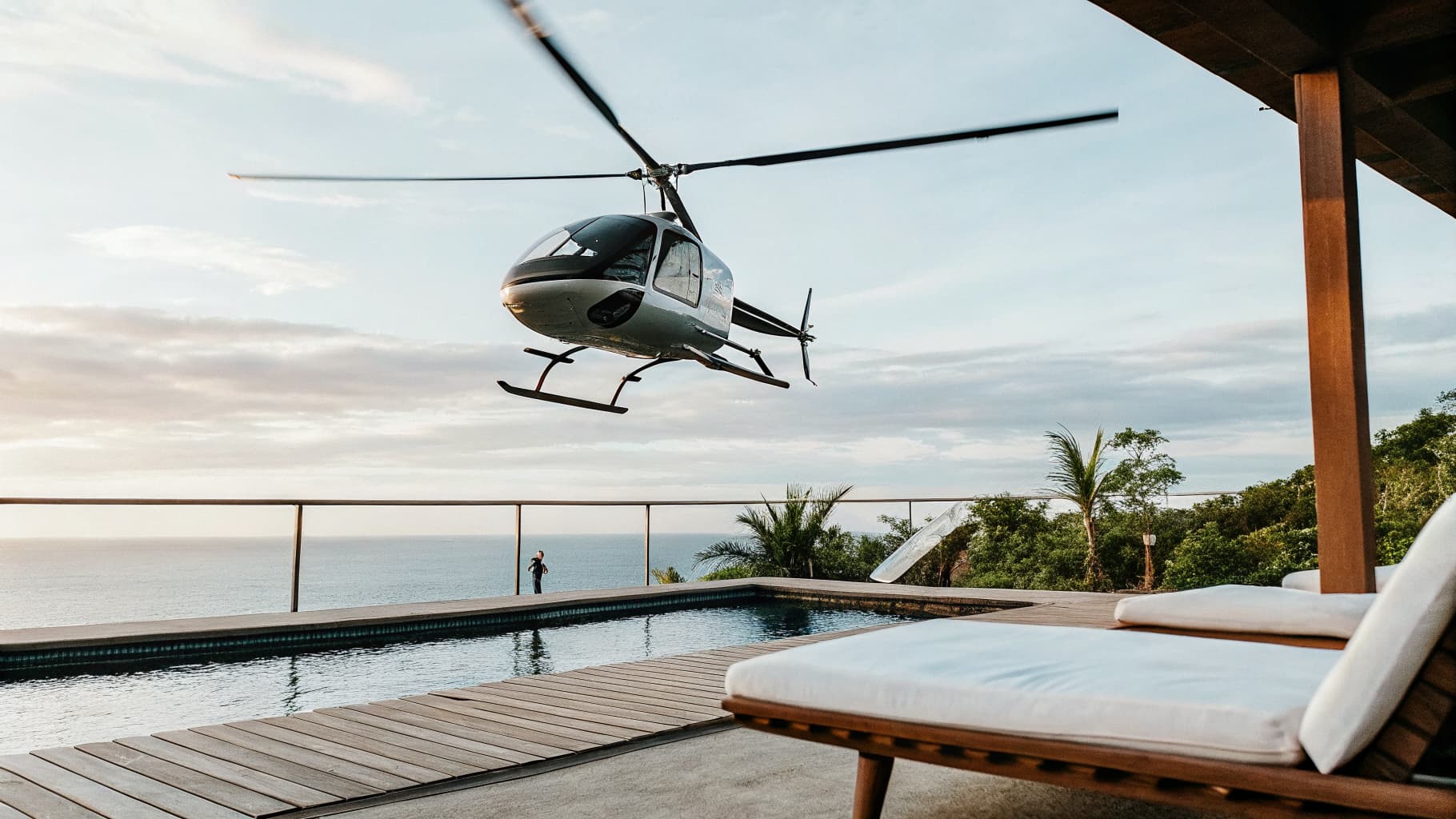 Balicopter helicopter flying over Bali coastline